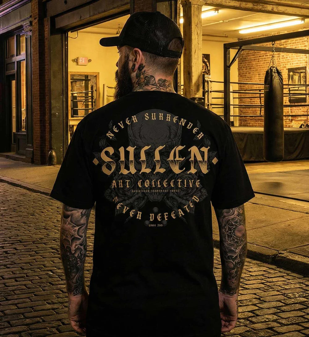 NEVER DEFEATED PREMIUM TEE